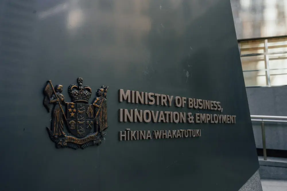 The Ministry of Business, Innovation and Employment sign with a bronze coat of arms, illustrating innovation and development